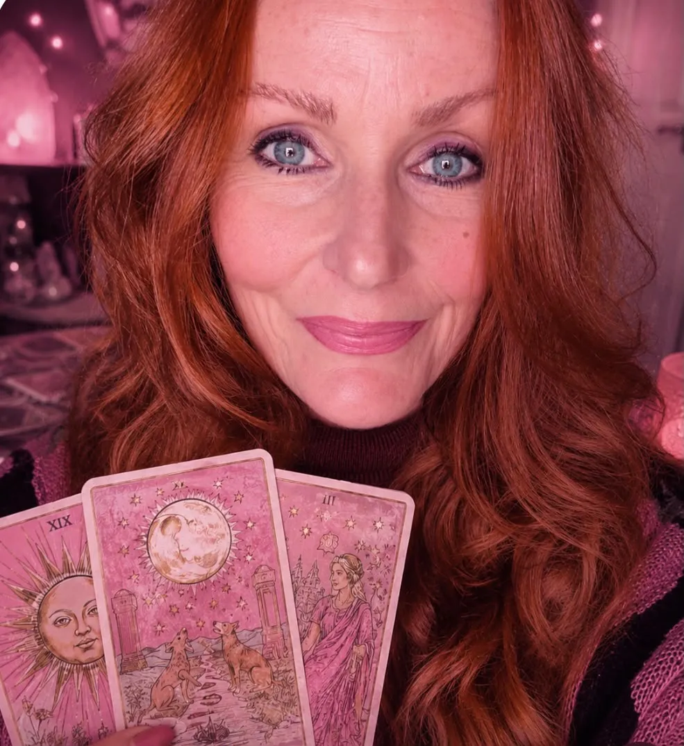 Cate McMurray holding tarot cards Walsall spiritual life coach