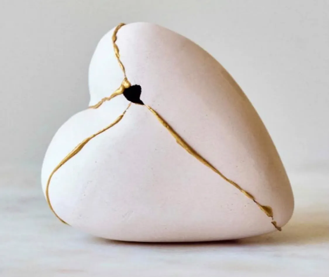 Ceramic heart mended with gold for the Sacred Rose and Heart Ceremony